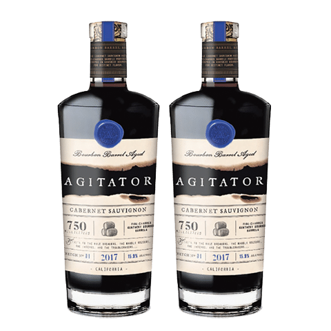 Agitator bourbon barrel aged wine bottles.