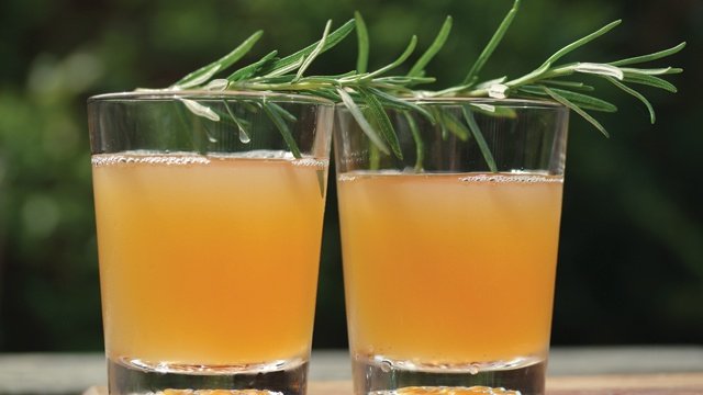 Whiskey Rose cocktail with rosemary sprig