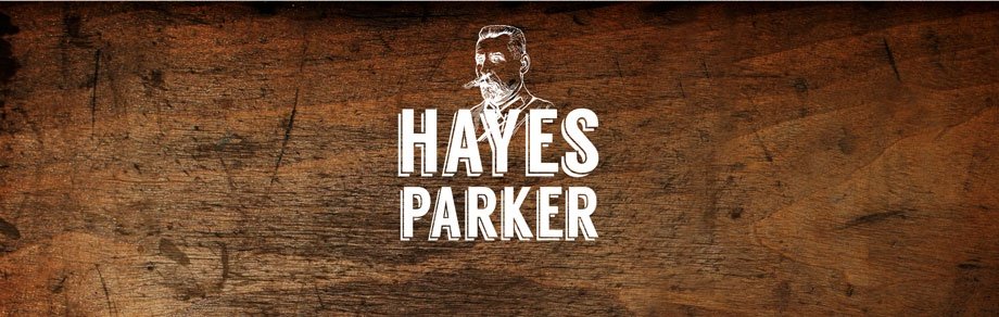 Hayes Parker logo on wood background
