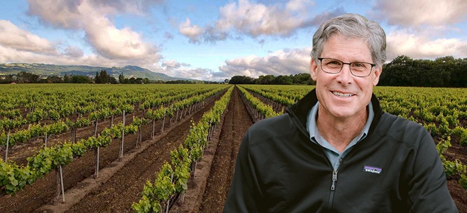Sonoma-Loeb winemaker, Phillip Titus, in front of a vineyard
