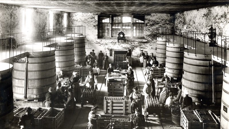 Historical photo of an active distillery.