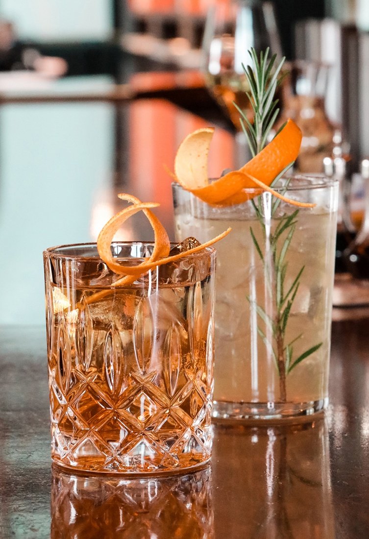 gin cocktail with orange peel